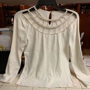This is a blouse from talbot